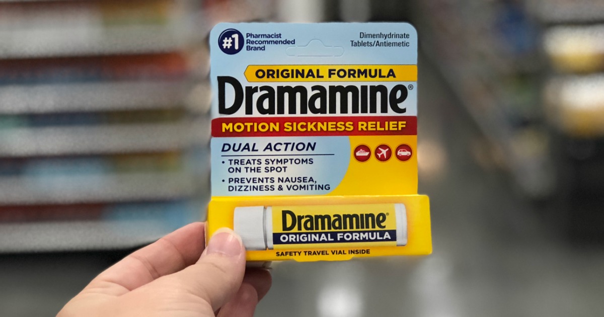 Hand holding up Dramamine Original Formula