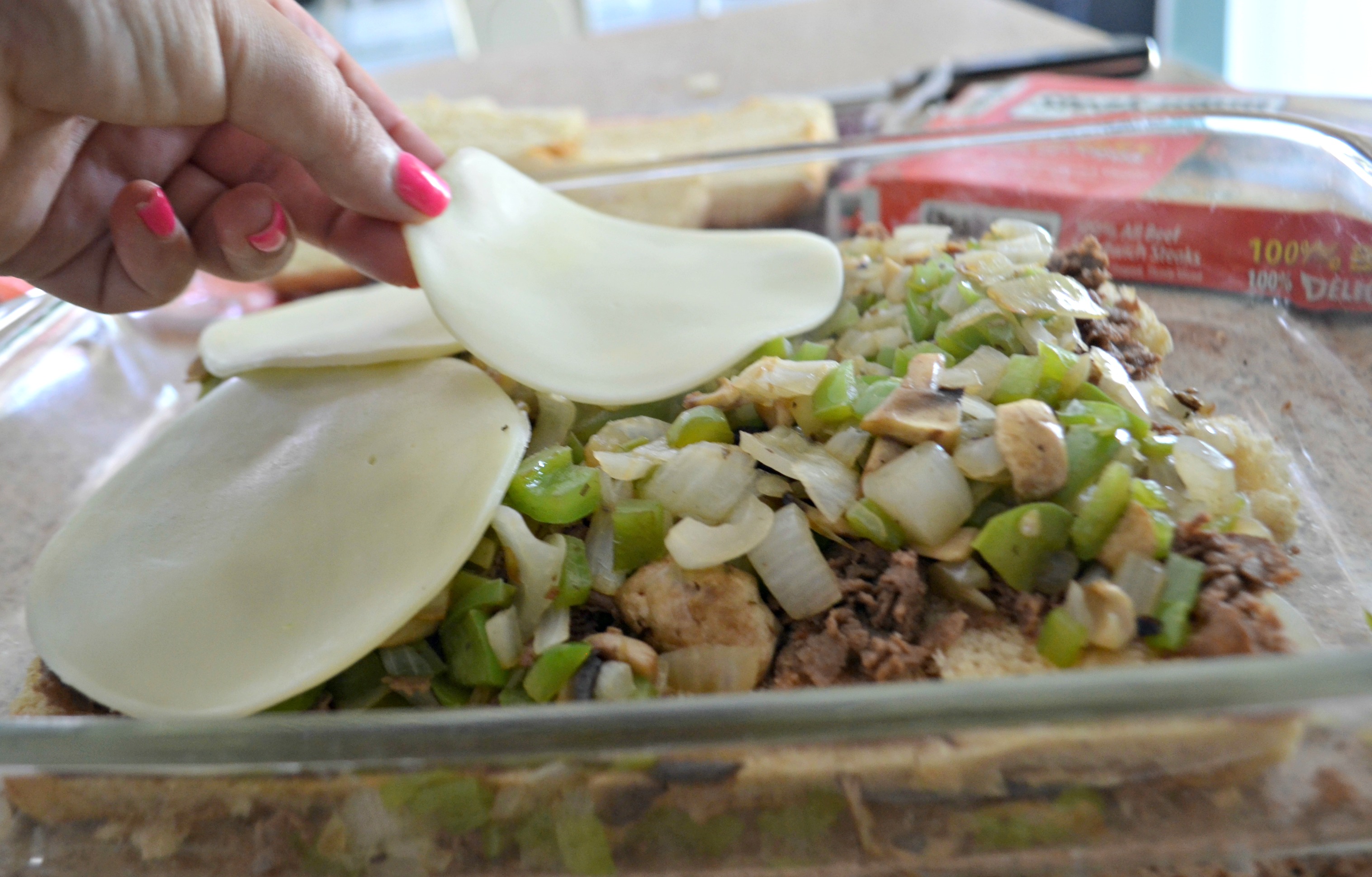 Philly Cheesesteak Sliders - adding provolone to the sliders