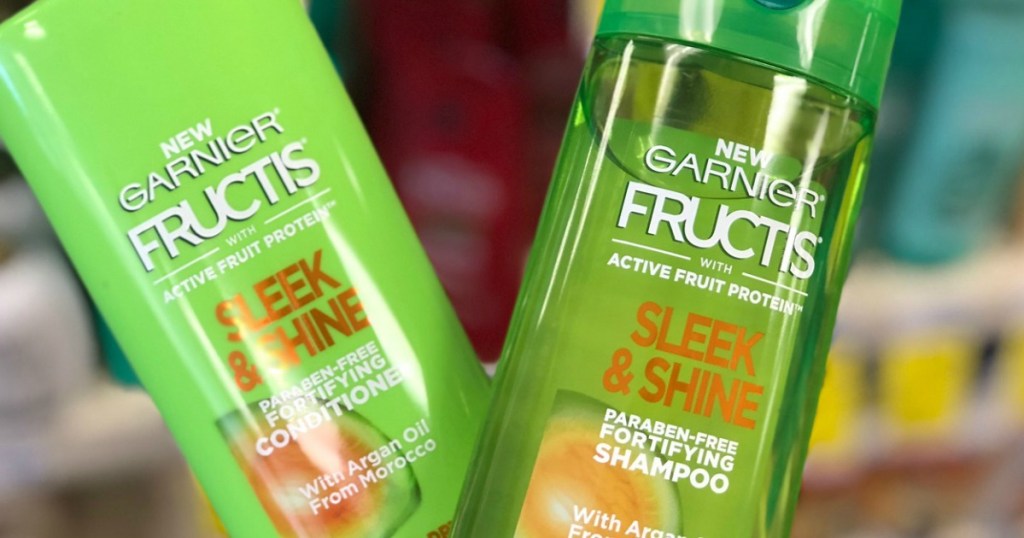 hand holding garnier fructis