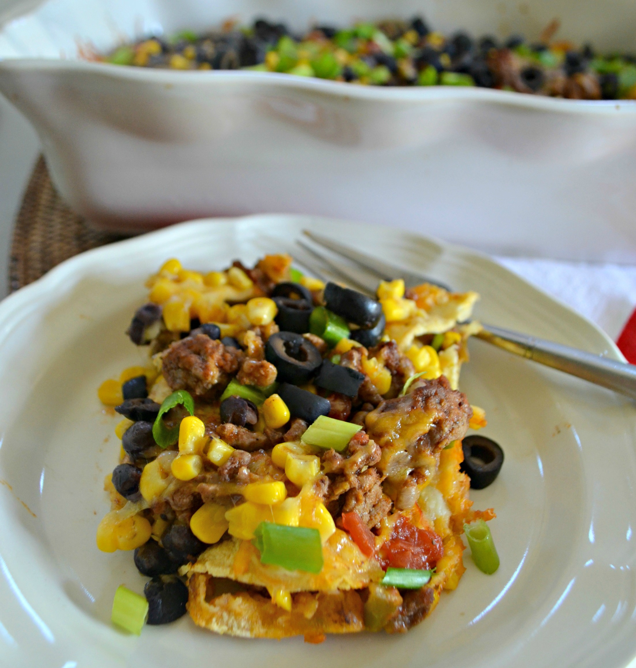 Easy Mexican Lasagna - closeup of the lasagna served on a plate