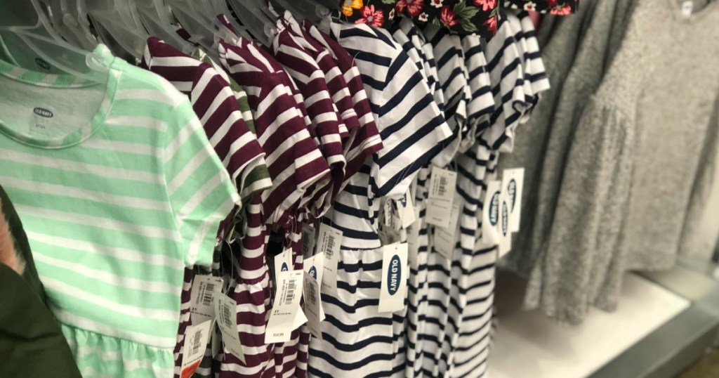 Old navy girls jersey swing dresses hanging on rack