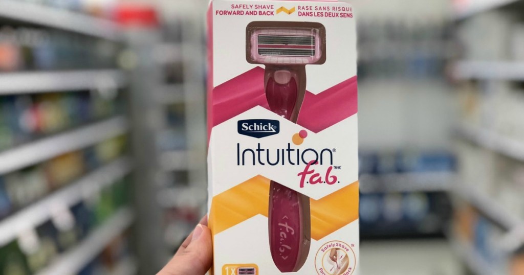 hand holding schick razor 