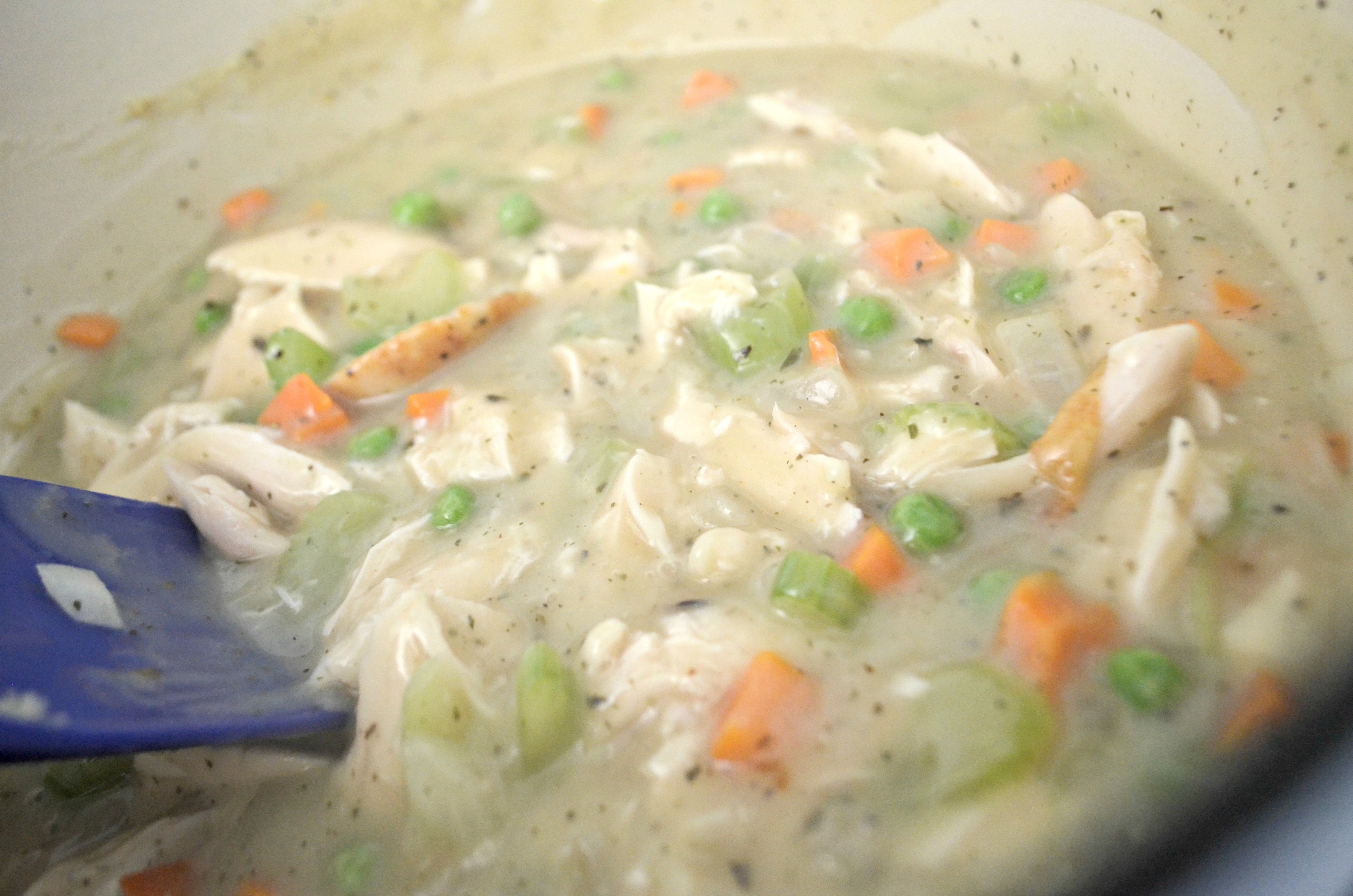 Sheet Pan Chicken Pot Pie - preparing the chicken pot pie ingredients in a bowl