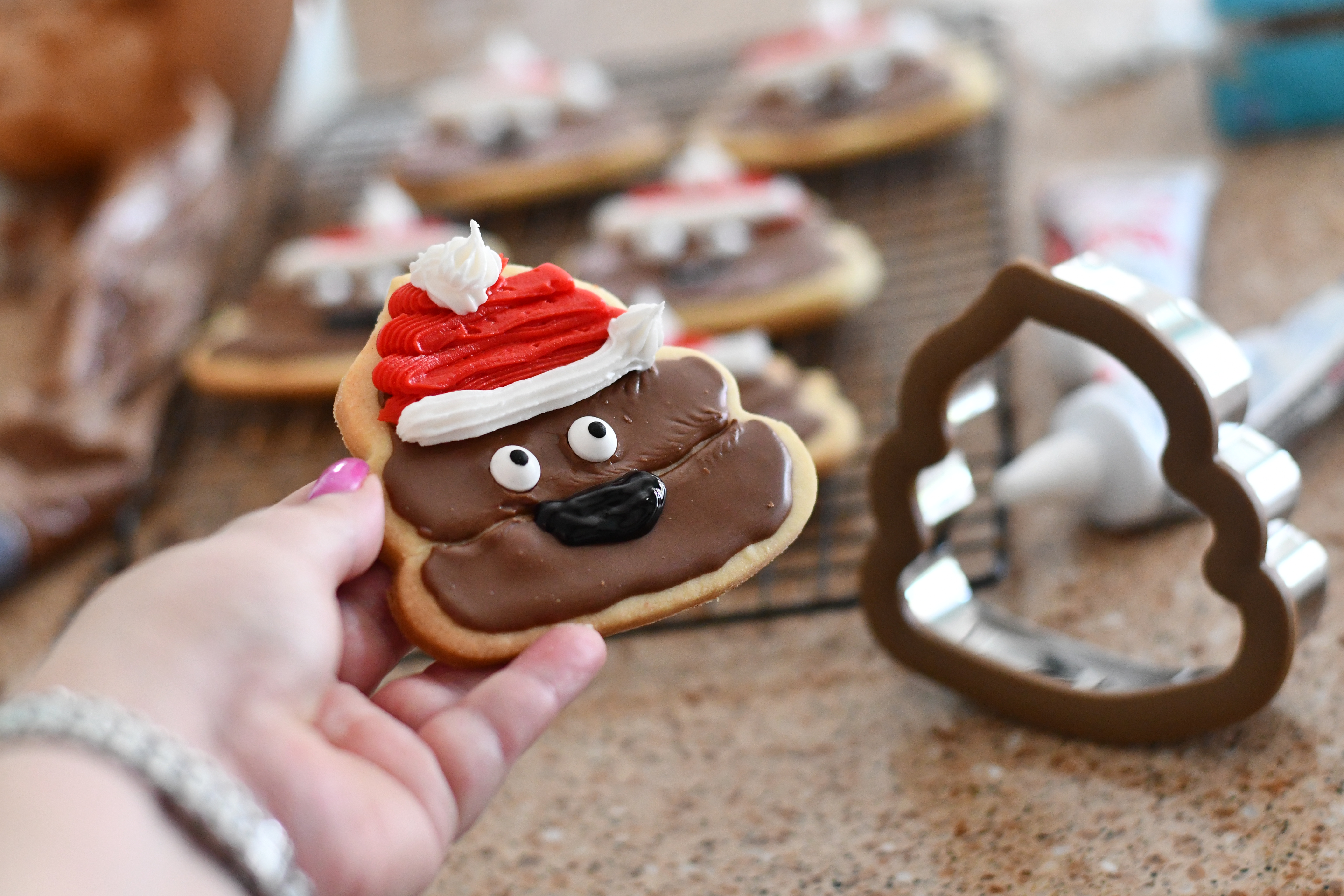 DIY Poop Emoji Santa Christmas Cookies – onlinepleted cookie closeup