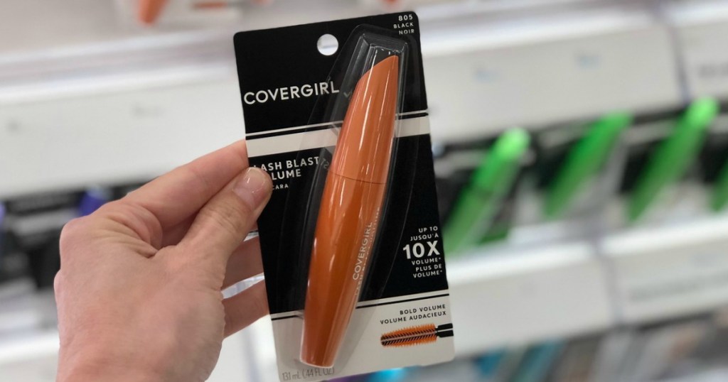 hand holding CoverGirl mascara