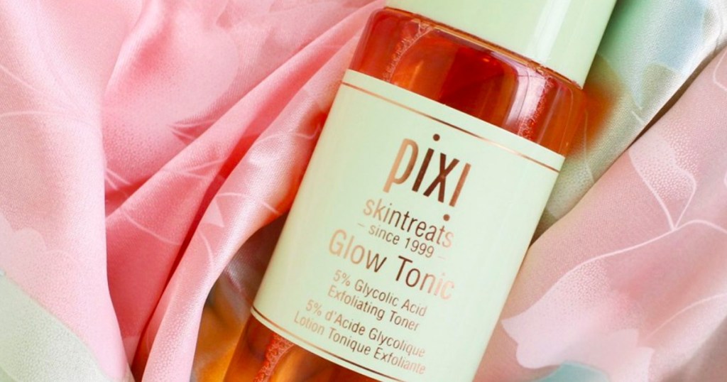 bottle of Pixi glow tonic on a sheet