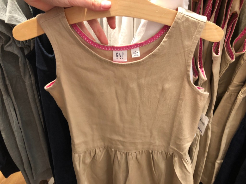 holding Gap kids dress 