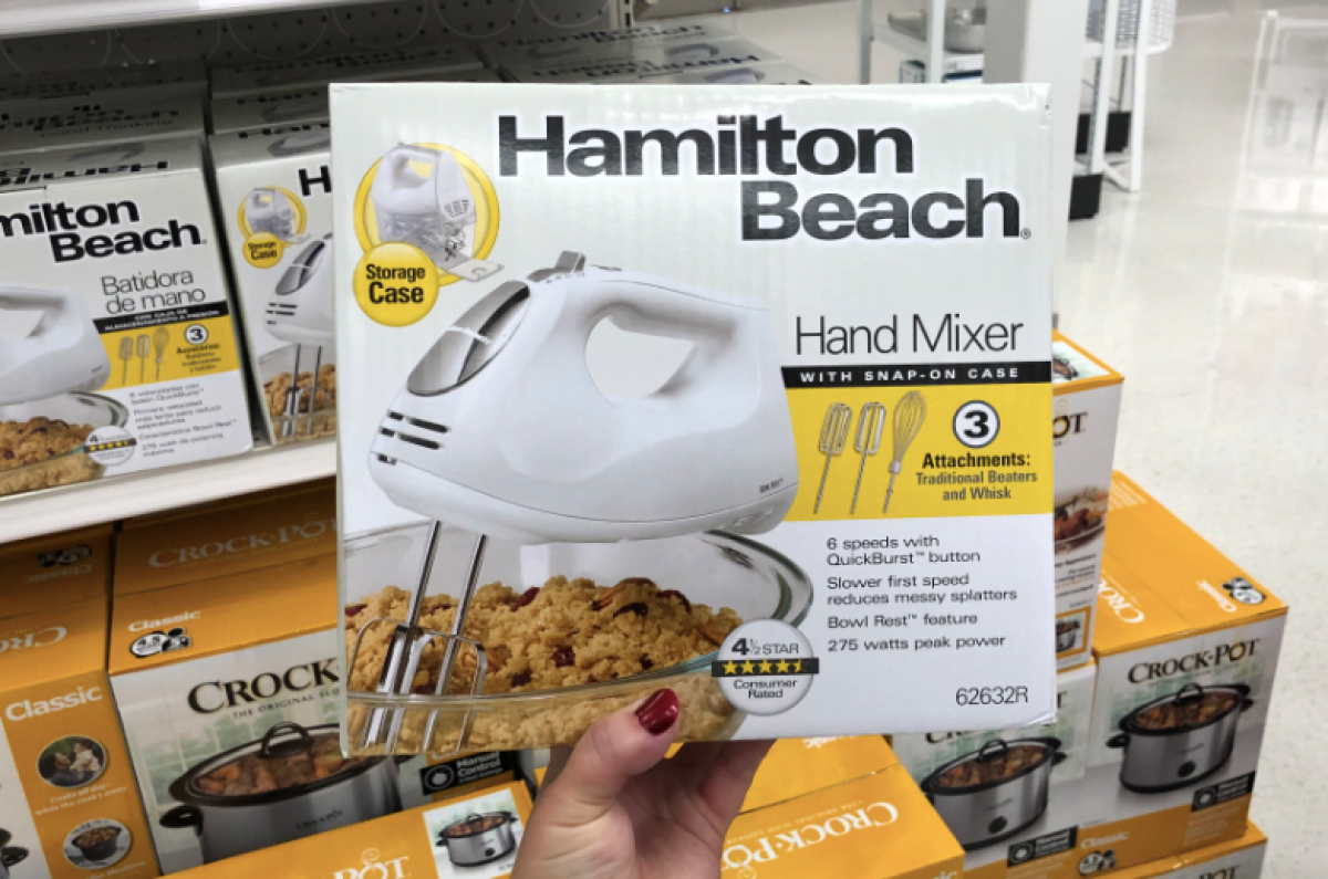 hand holding Hamilton Beach 6-speed Hand Mixer