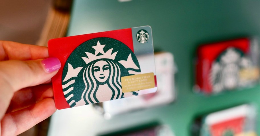 starbucks gift card held by hand