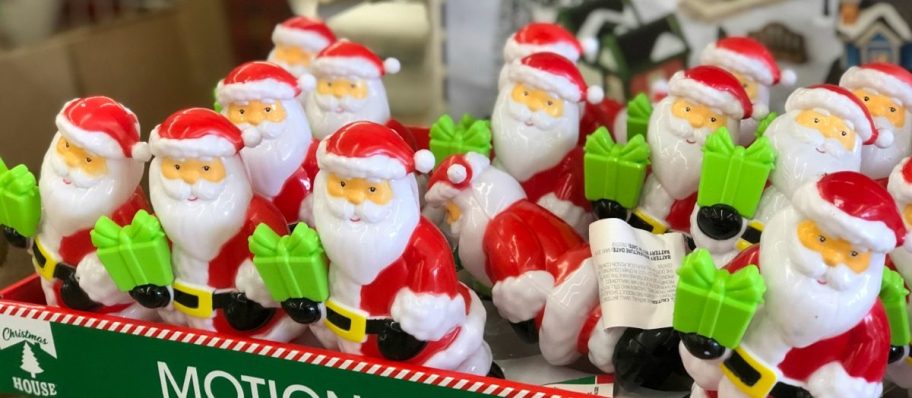 small santas on a shelf