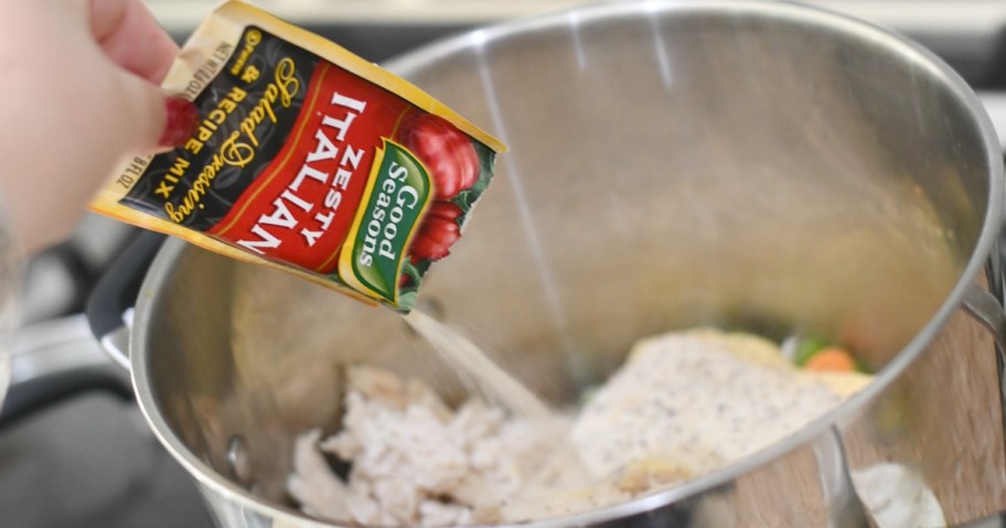 pouring zesty italian dressing into a pot