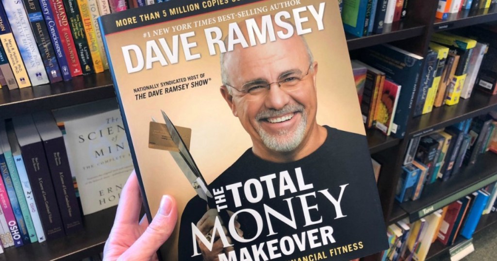 dave ramsey book in hand