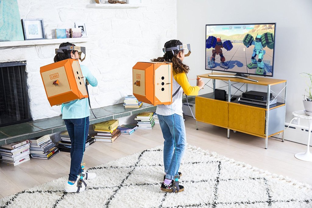 kids wearing Nintendo Switch Labo creations playing video games