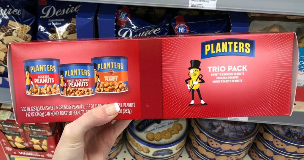 hand holding planters peanuts 3 pack