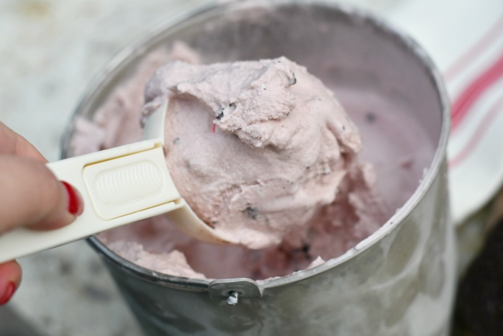 scooping homemade peppermint ice cream