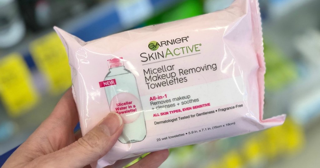 woman holding Garnier Micellar Wipes