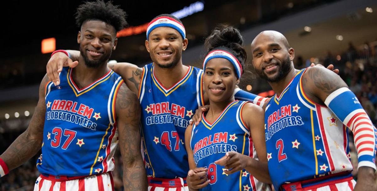 Harlem Globetrotters smiling at the camera