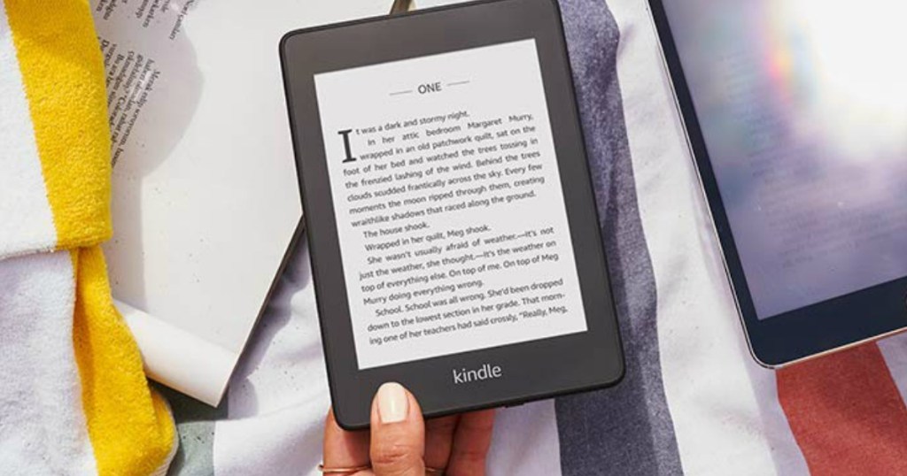 hand holding a Kindle paperwhite