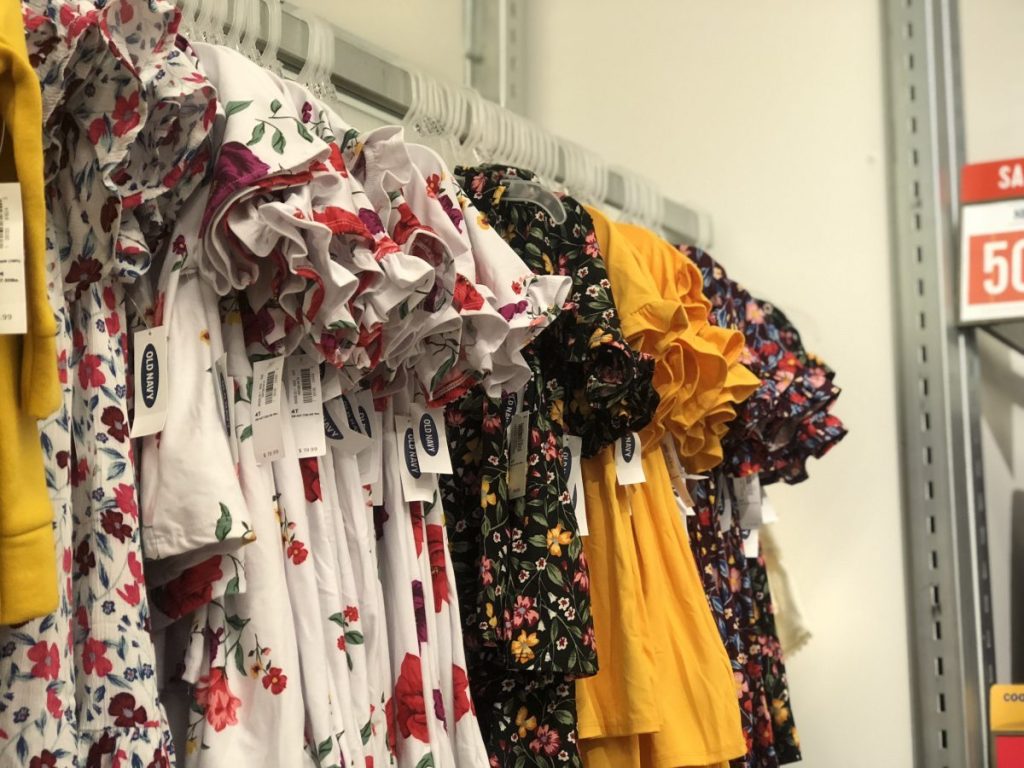 Floral toddler dresses hanging on a rack at Old Navy