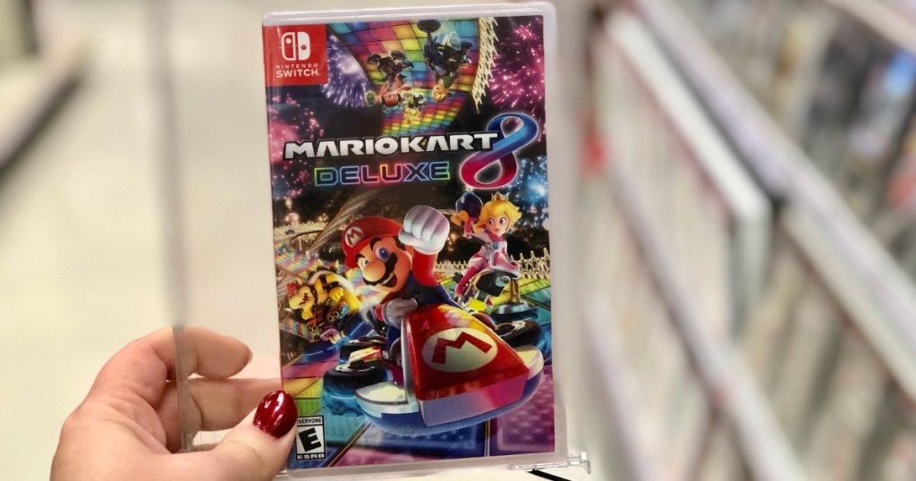 Mario Kart 8 for Nintendo Switch game held in hand