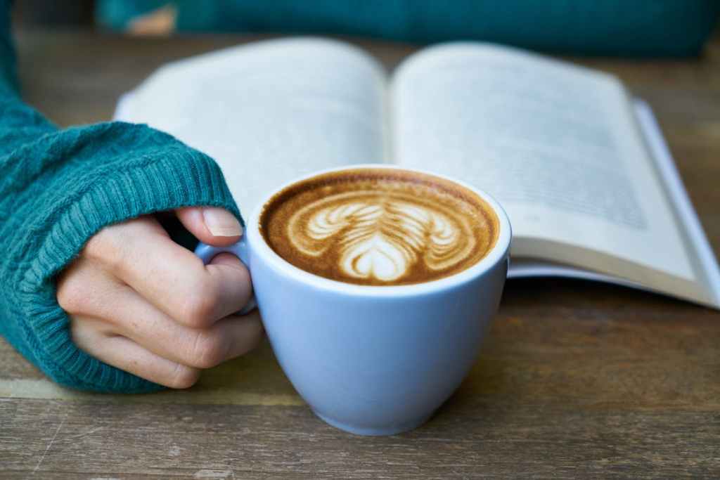 reading a book with coffee