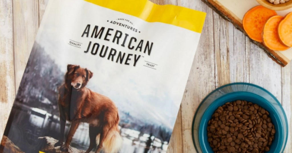 american journey dog food bag with bowl of dog food beside it