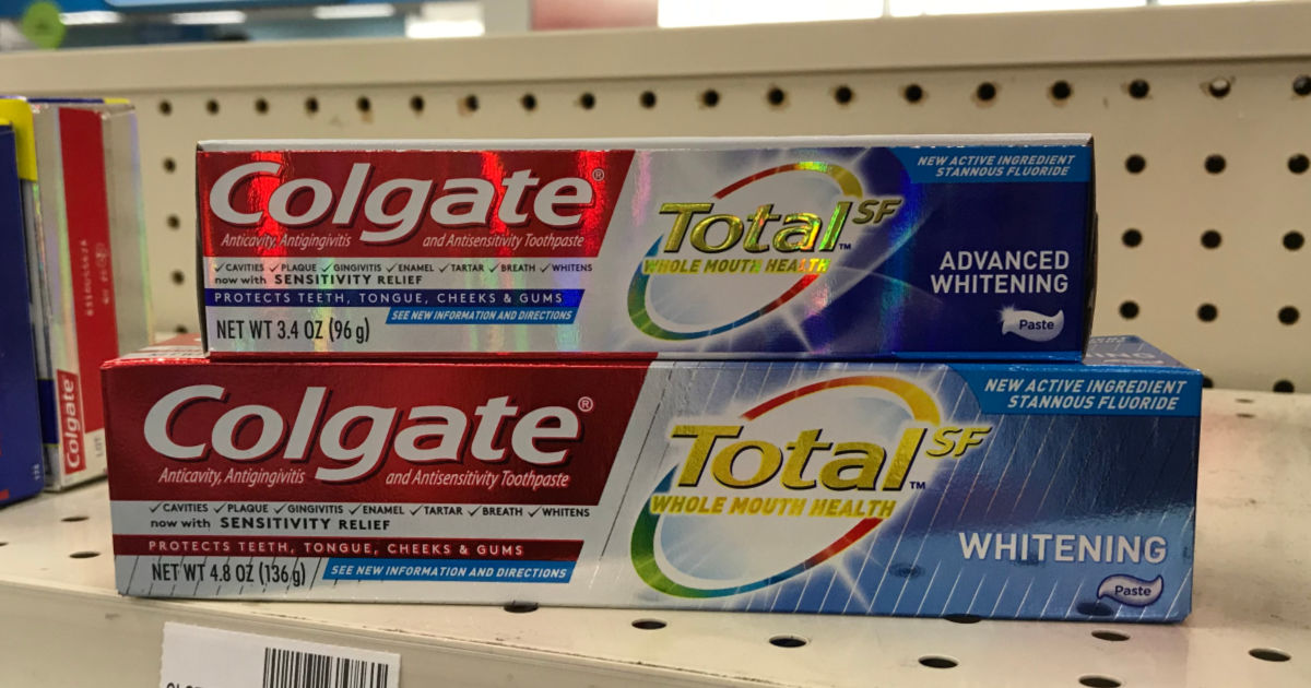 two boxes of colgate total toothpaste