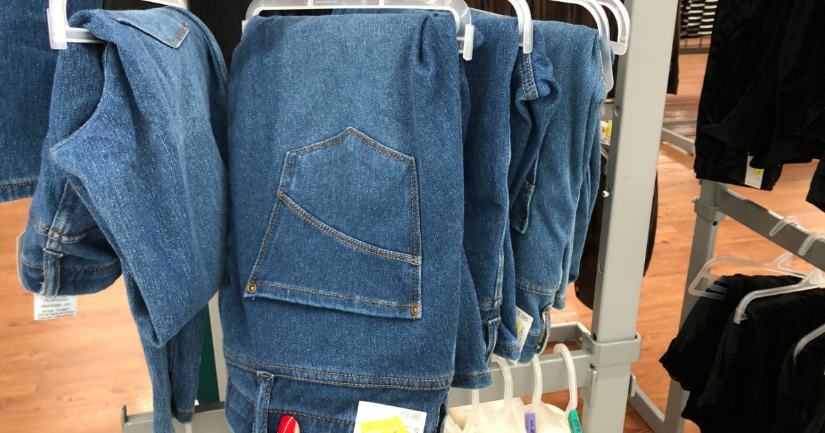 jeans hanging on clearance rack in store