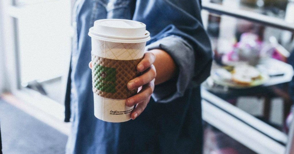 Woman holding Panera Coffee