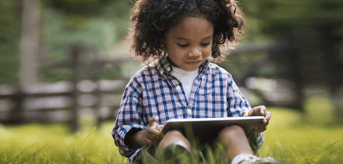 Little Boy with Reading IQ App 