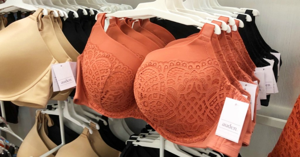 rust colored bra hanging on rack