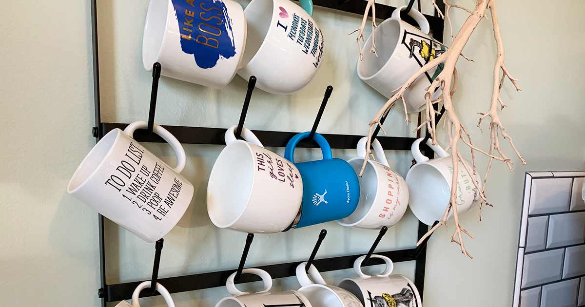 coffee mug rack with various coffee mugs