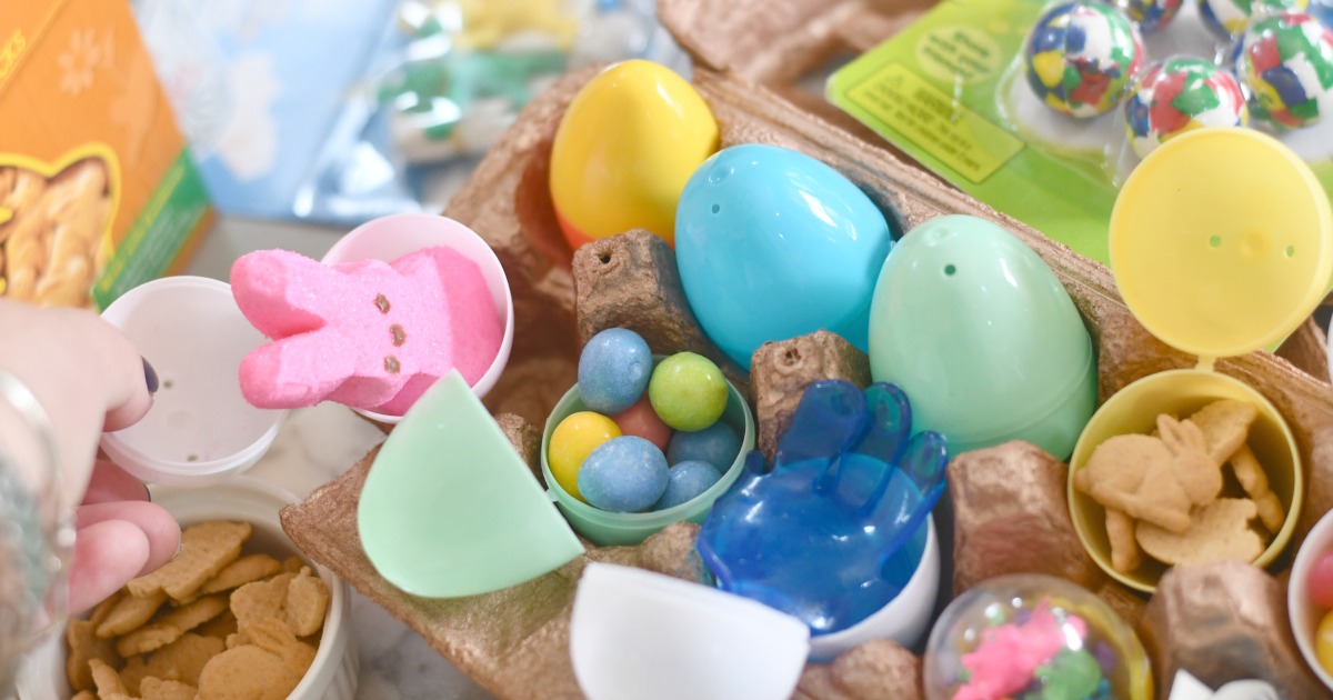 filling an egg carton with plastic eggs