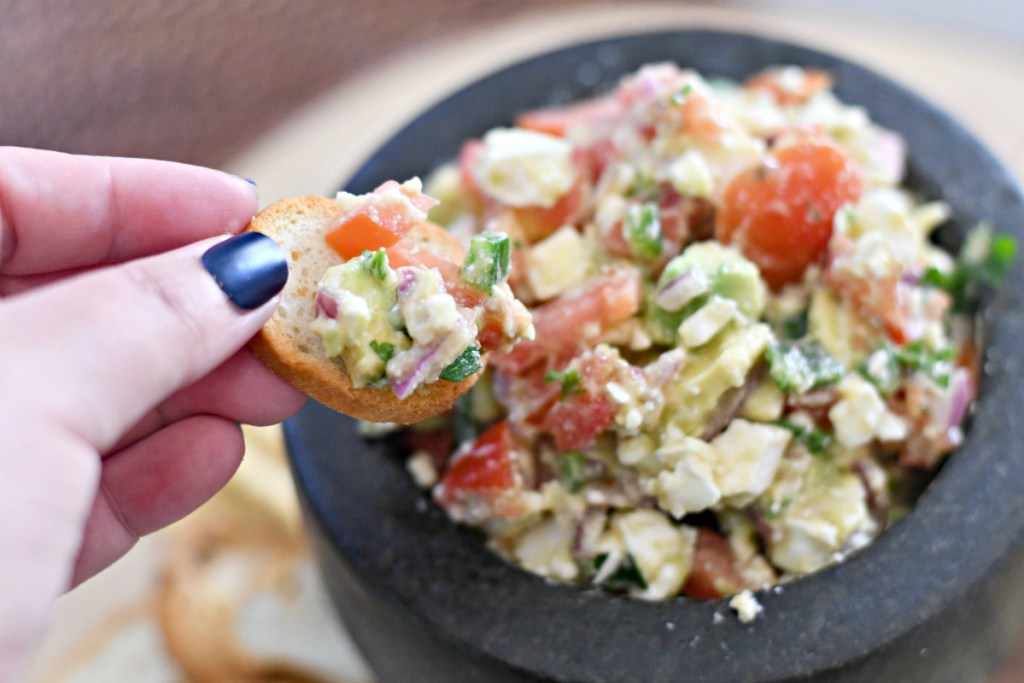 feta avocado salsa dipped with melba toast