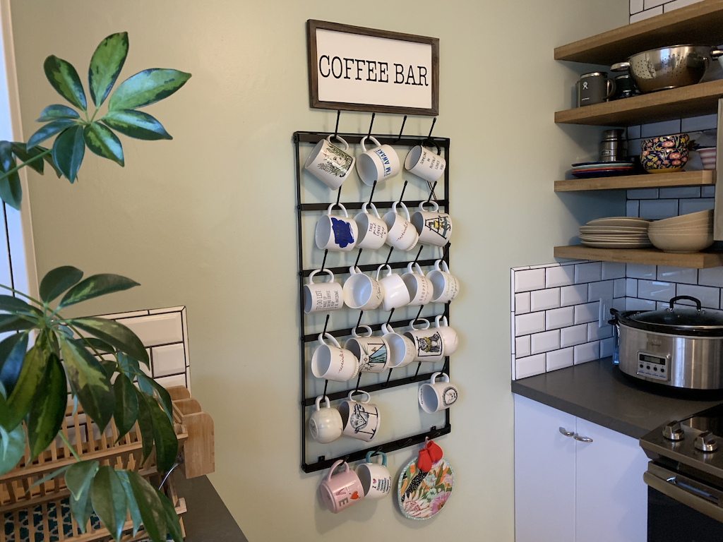 Coffee Rack hanging in cozy kitchen