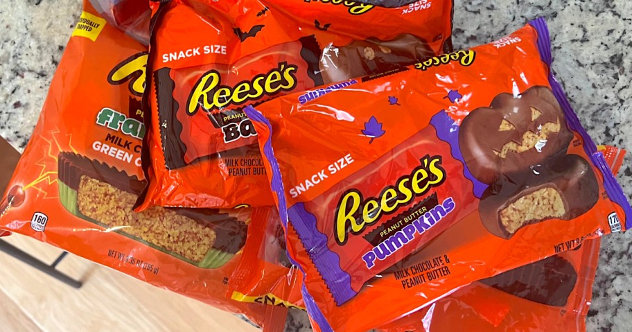 bags of orange candy on counter