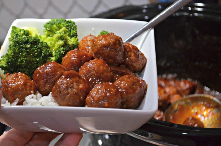 a bowl of slow cooker meatballs made with chili and cranberry sauce