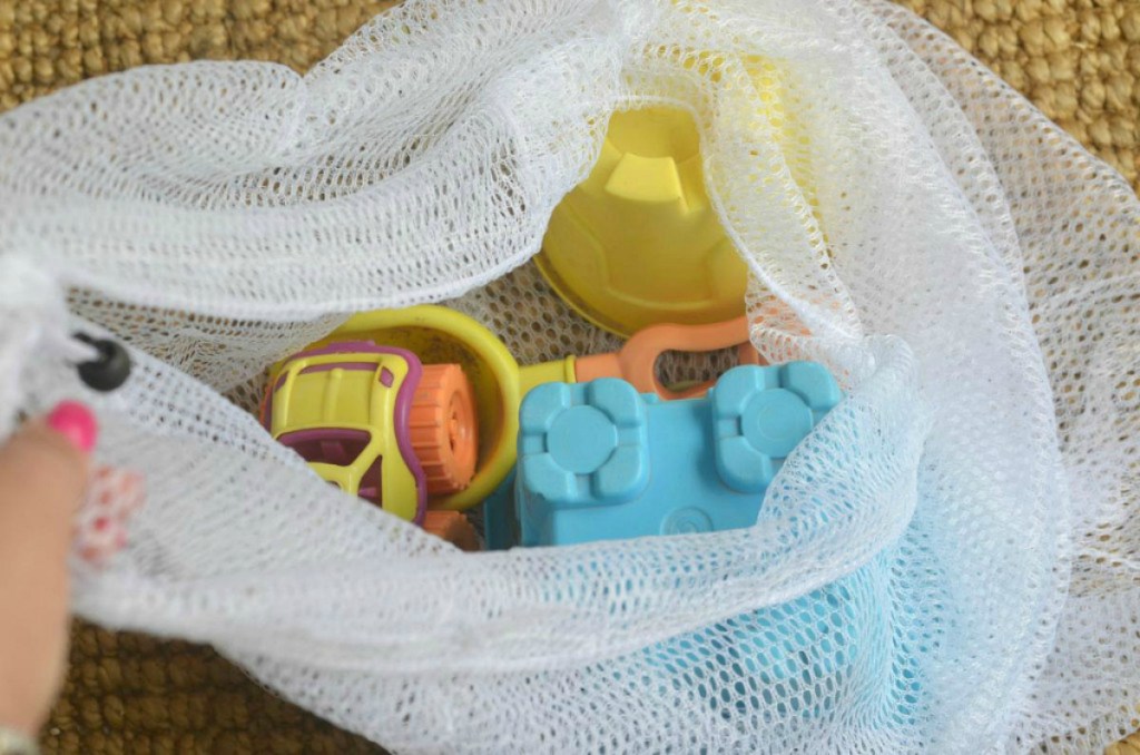 Dollar Tree mesh bag with beach toys