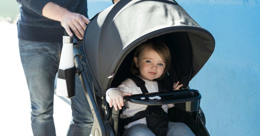 child riding in stroller