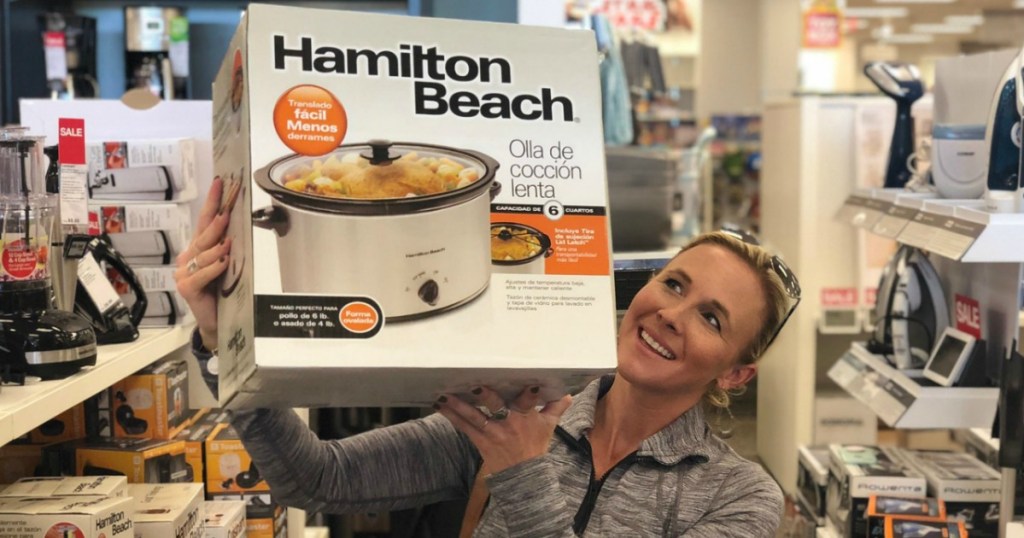 Collin holding Hamilton beach crock pot