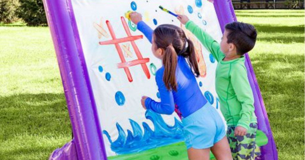 Children painting on HearthSong Art Easel