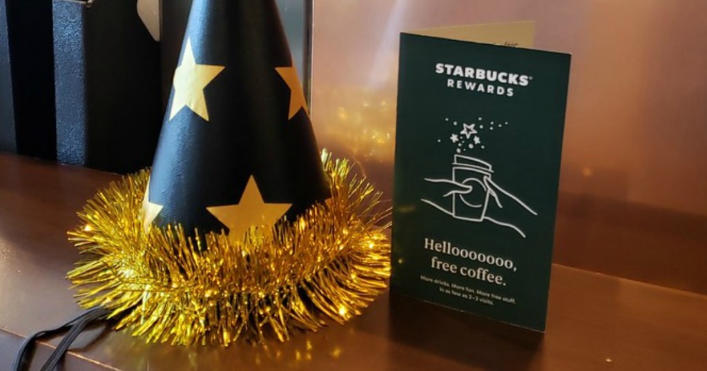 party hat next to Starbucks rewards voucher