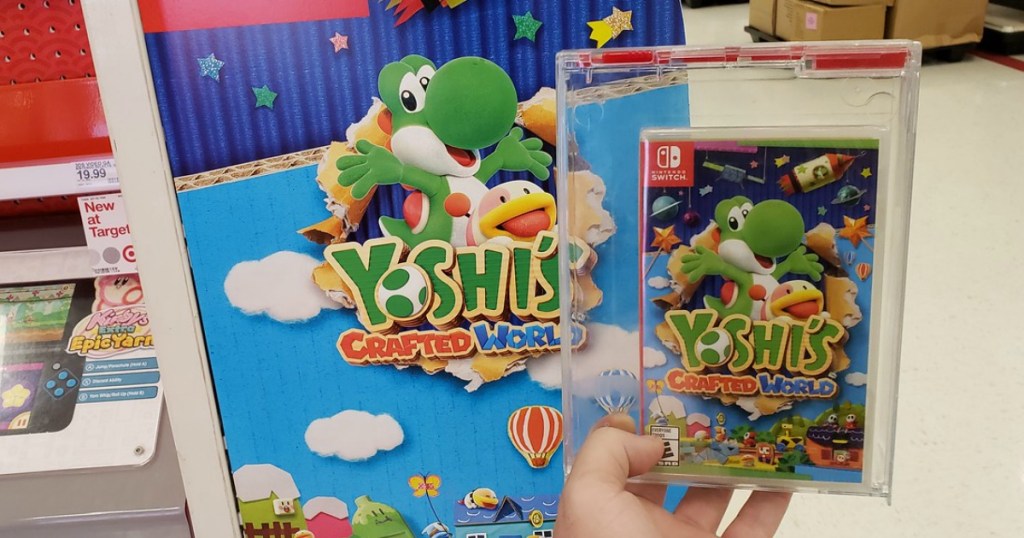 hand holding yoshi video game