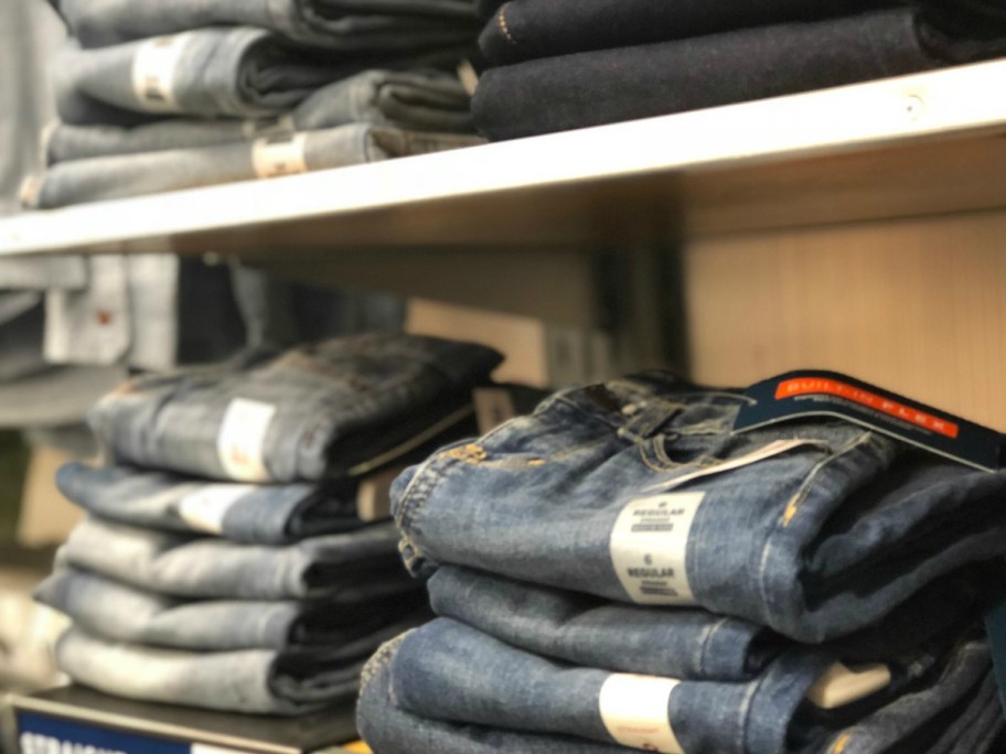 old navy mens jeans folded on shelf