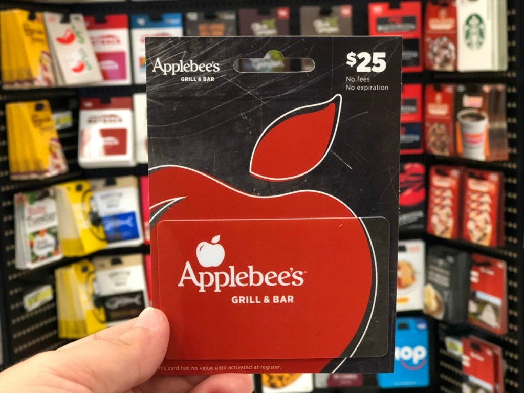 hand holding applebee's gift card