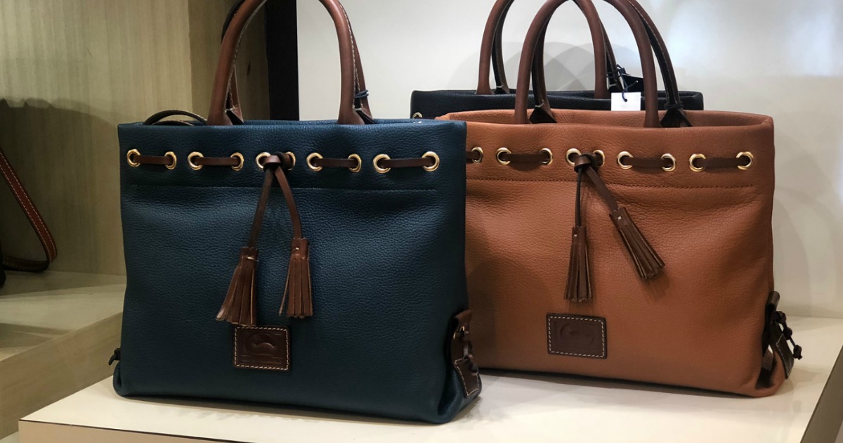 Dooney Bourke Wakefield Totes on store counter