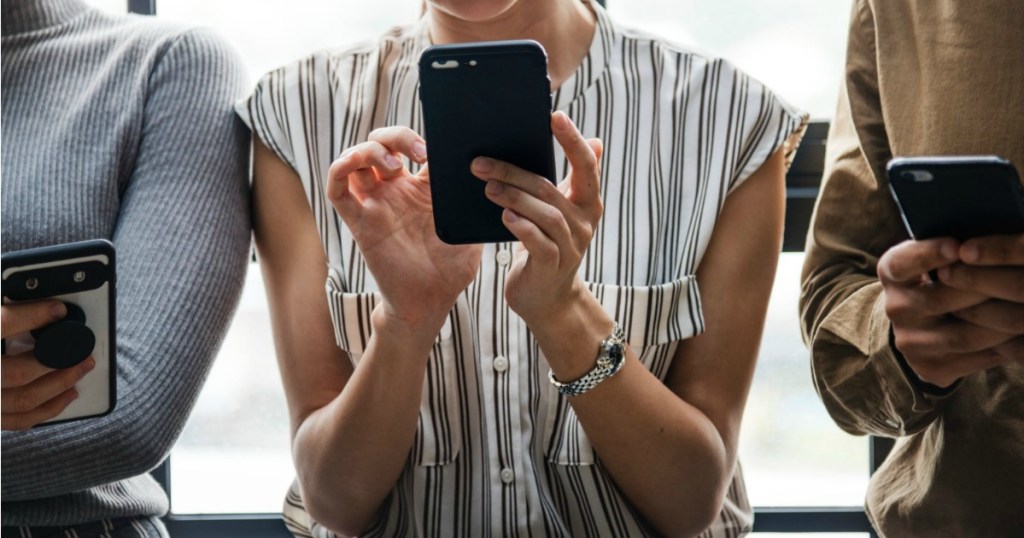 people holding cellphones