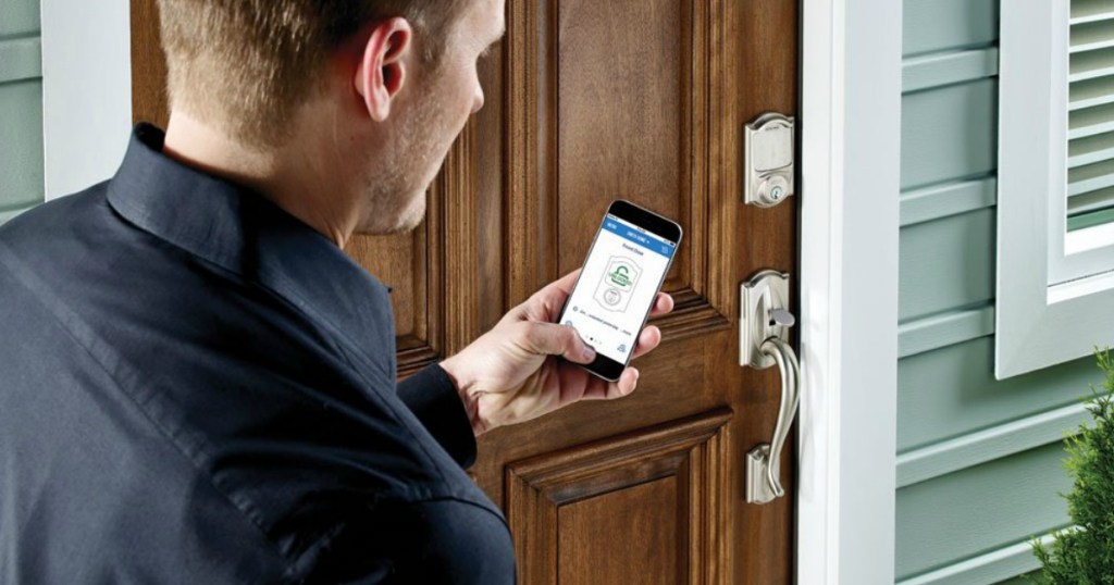 man using smart door lock