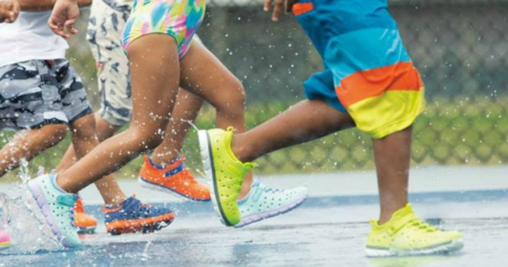 kids playing in the water wearing Stride Rite Made 2 Play Phibian Water Shoes