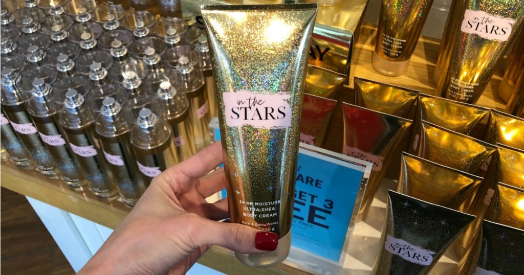 hand holding in the Stars Body Cream BBW